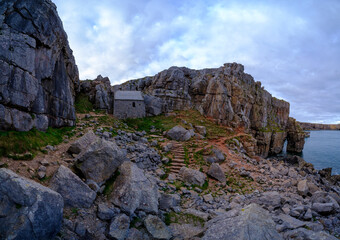 The chapel of St Govan's built into the cliffs on the Pembroke Coast