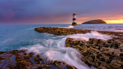 Winter sunrise on Trwyn Du Lighthouse at Penmon Point, Anglesey, Wales