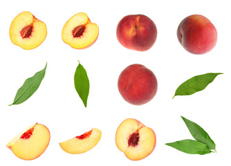Fresh peaches and green leaves on white background