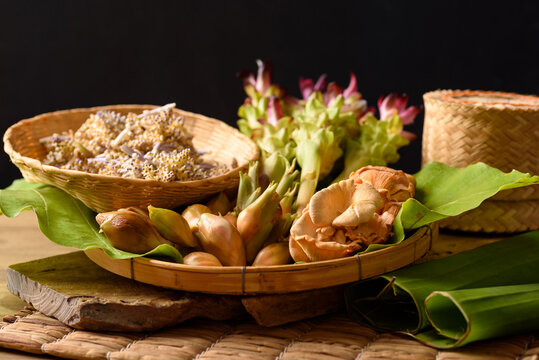 Natural fresh edible flower are an ingredient in local thai cuisine on black background
