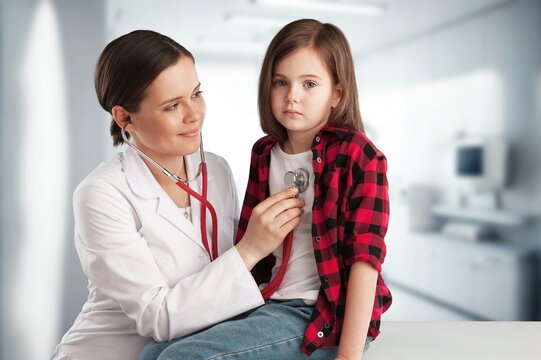 Young doctor listen heartbeat with a stethoscope of the patient.