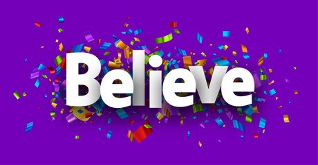 Believe sign over cut out foil ribbon confetti background.