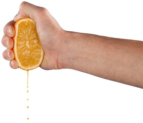 Hand holds orange fruit and squeezes out juice squeeze