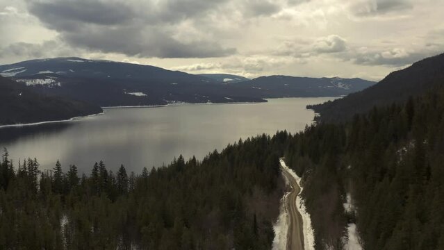 Aerial Tranquility: Serene Shuswap Lake Surrounded by Pristine Mountains