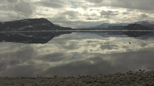 Aerial Tranquility: Discover the Pristine Serenity of Shuswap Lake's Cloudy Day Reflections