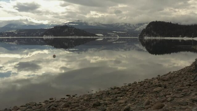Aerial Symphony: Pristine Mountains, Calm Waters, and Reflections at Shuswap Lake