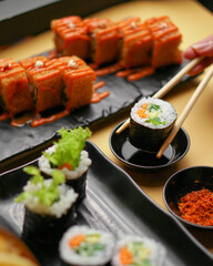 sushi with chopsticks