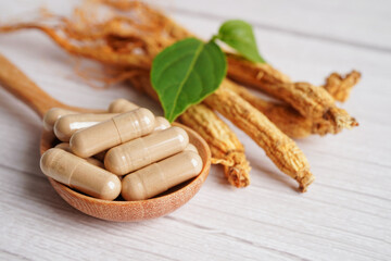 Ginseng roots and green leaf, healthy food.