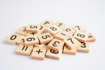 Number wood block cubes for learning Mathematic, education math concept.