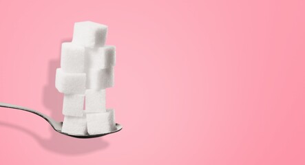 Sweet sugar and cubes on color background