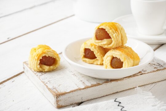Pineapple Tart Roll cookies or Malay named Tart Nanas Gulung on white background