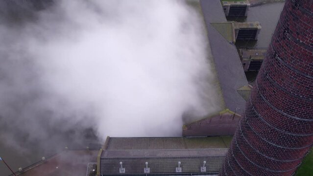 Drone flies through steam of Steam pumping station Lemmer Woudagemaal, Aerial