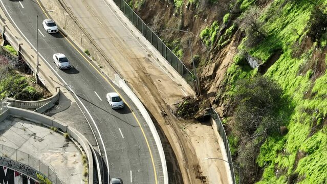 Aerial shot of several mud slides after heavy rain along the 5 freeway in Los Angeles California.