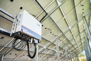 Tunrning on solar photovoltaic panel. Preparing solar inverter for work. New PV inverter converting...