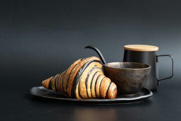 Close up Chocolate Croissant on Black Background