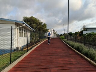 A woman walking in the morning around Whangarei city, New Zealand.