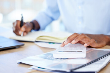 Business, closeup and black man with a calculator, writing and notebook with planning, finance and budget. Male person, accountant and employee with documents, paperwork and folders with numbers