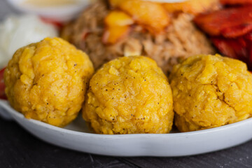 appetizers made from bananas, patacon or toston and tacacho typical foods of the Peruvian jungle