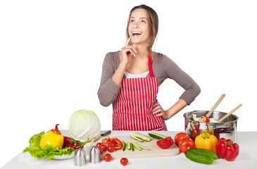 Obraz na płótnie Canvas Portrait of a Woman Cooking Vegetables