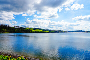 View of the Sorpesee and the surrounding nature near Sundern. Landscape in the Sauerland at the lake with green forests.
