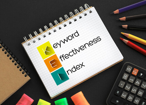 KEI - Keyword Effectiveness Index acronym on notepad, business concept background