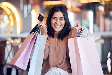 Portrait, excited and woman with a credit card, shopping and bags with transactions, fashion and...