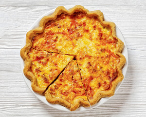 quiche with cheese and bacon filling on plate