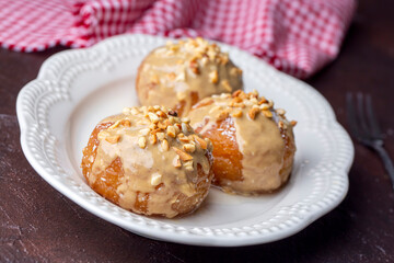 Traditional delicious Turkish dessert; Tahini and hazelnuts on Kemalpasa dessert