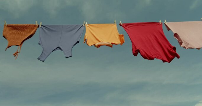 Clothes hanging to dry on a laundry line	
