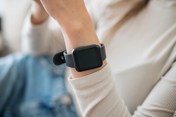 close up of a person hand with smart watch