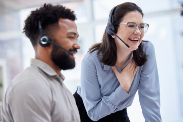 Cheerful caucasian call centre telemarketing agent training new mixed race assistant on in an office. happy supervisor troub - Powered by Adobe