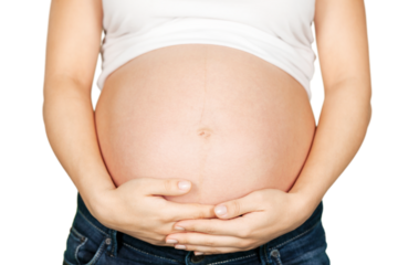 Beautiful pregnant woman holds her belly