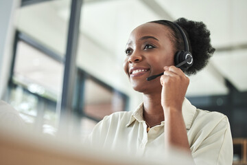 Black woman, call center and phone consultation with a smile in a office with contact us work....