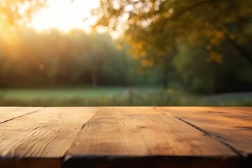 Wooden table in front of blurred autumn foliage background. Ready for product display montage