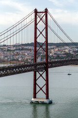 View of the 25th of April Bridge on a summer day in Lisbon