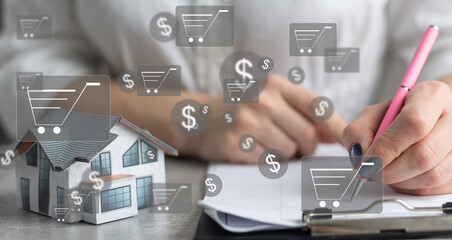 Online shopping and e-commerce concept. Young woman using laptop computer with shopping cart icon, order in online store, shopping on internet, concept on virtual screen with hands typing on keyboard