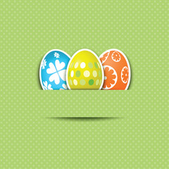 Cute background with Easter eggs on a polka dot pattern