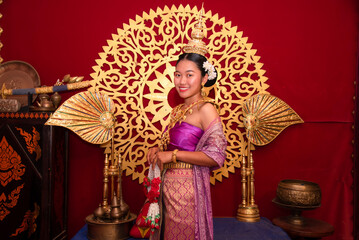 Beautiful Thai girl in Asian tourists is visiting at Sukhothai in Thailand.