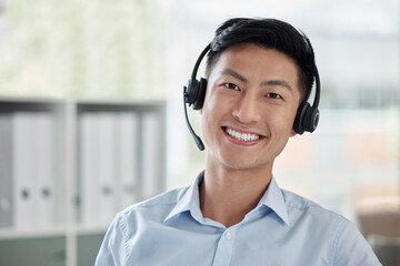 Asian man, call center and portrait smile with headphones in customer service, telemarketing or...