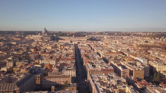Aerial Cinematic drone downtown  Piazza Rome Italy birds flying past buildings and streets of Vatican City St Peters Europe Sistine Chapel square morning upward movement