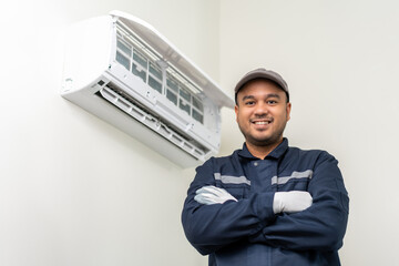 Air conditioner service indoors. Air conditioner cleaning technician He opened the front cover and...