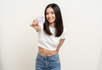 Portrait beautiful asian women standing pose holding credit card to shopping payment. Attractive...
