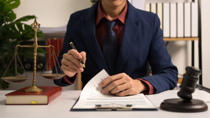 Male lawyer working with law book, A legal binding, Unilateral contract, Multilateral,...