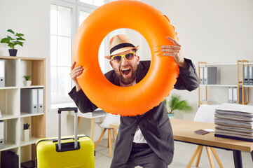 Happy funny crazy excited business man or office worker in suit jacket, sun hat and sunglasses...