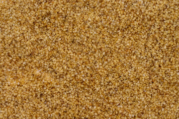 Pile of sesame seeds as background, spice or seasoning as background. Close-up Sesame seeds