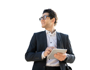 A male business manager in a business suit uses a tablet goes to the office