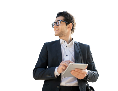 A male business manager in a business suit uses a tablet goes to the office