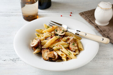 penne pasta with sauce and mushrooms