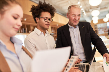 Startup founders and business consultants work together