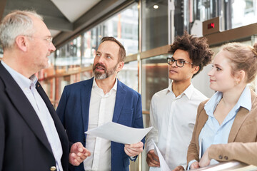 Business team people talk about balance sheet in meeting